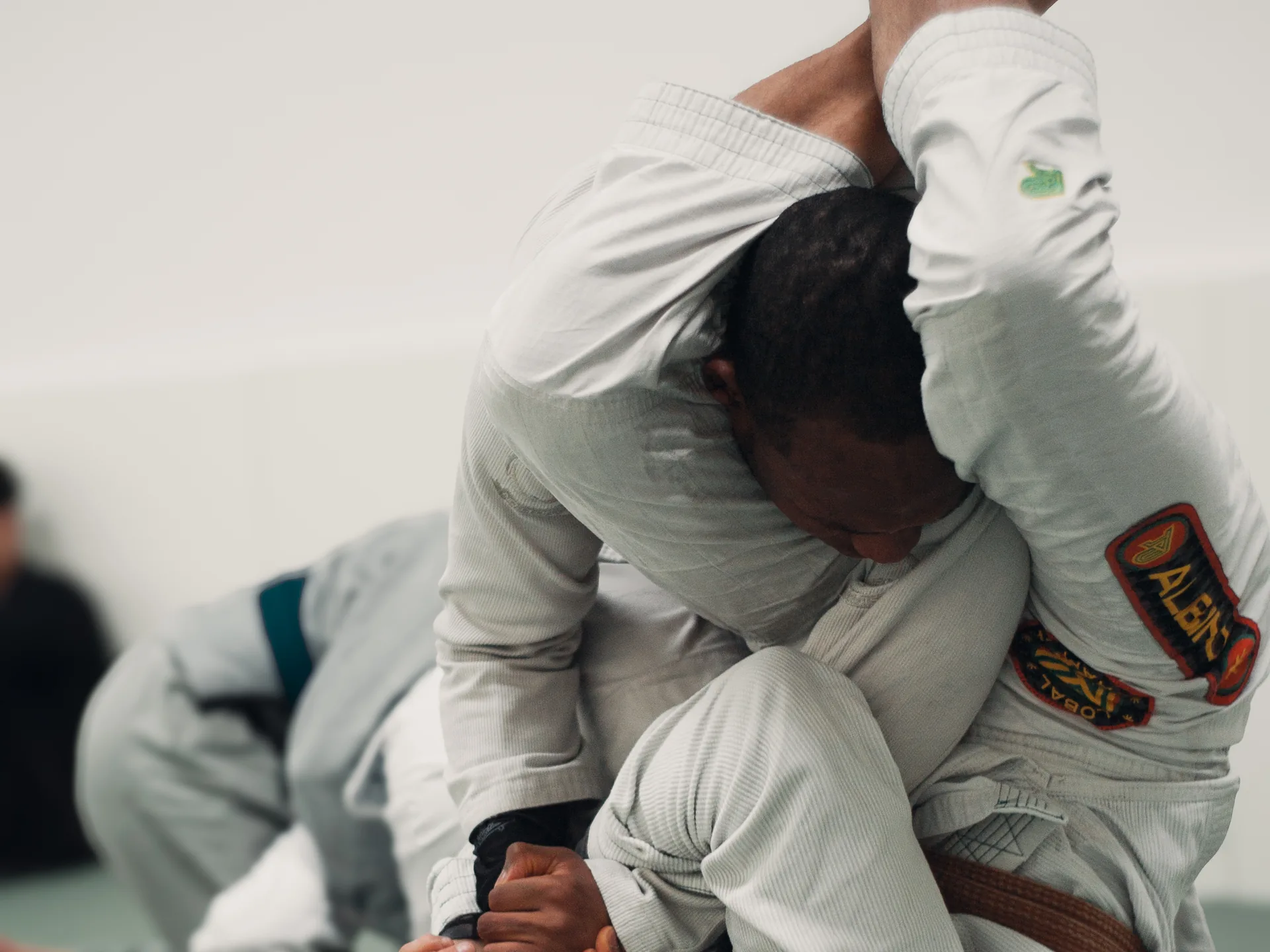 Students training in the gi at Princeton BJJ